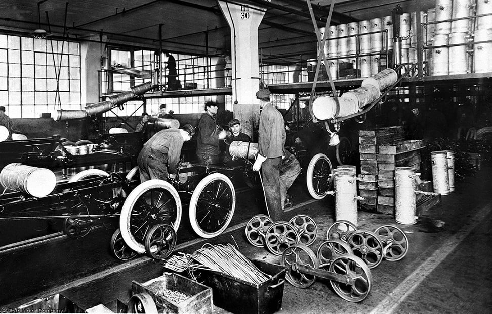 Gas tanks being installed on the new assembly line, late 1913